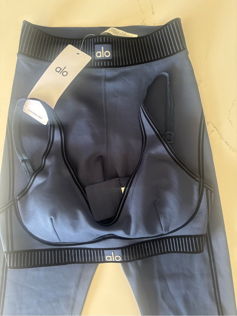 ALO Yoga High-Rise leggings AND sports Bra in Slate Blue with Black Trim